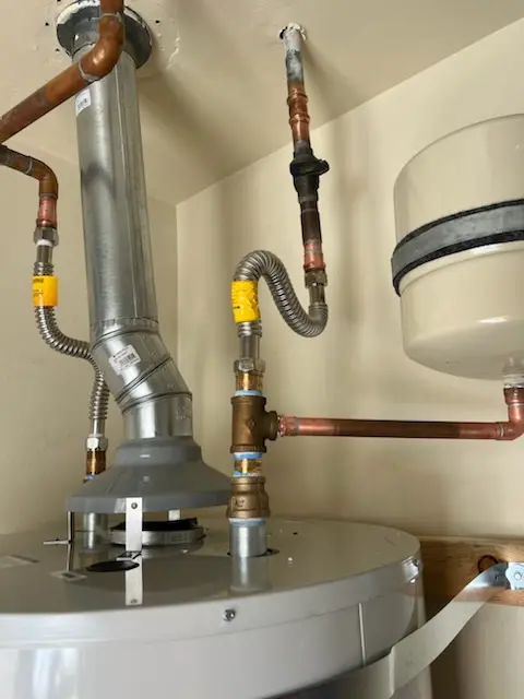 Water heater installation and plumbing repair in Raynham
